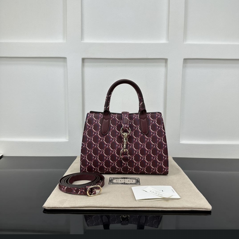 G*u*i shopping bags
